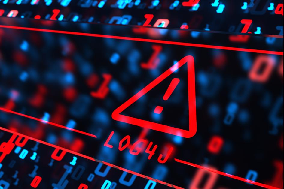 czerwony trójkąt z wykrzyknikiem w środku unosi się wśród czerwonych i niebieskich cyfr